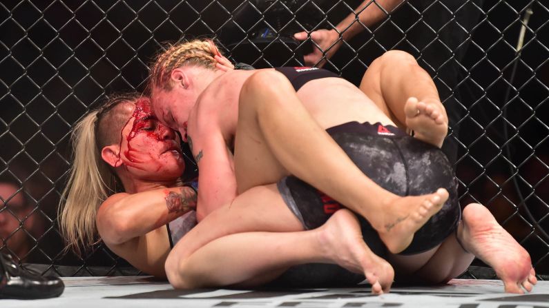 Valentina Shevchenko, top, fights Priscila Cachoeira during a UFC event in Belem, Brazil, on Saturday, February 3. Shevchenko won the bout with a second-round submission.