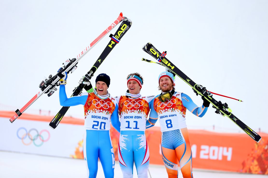 Silver medalist Christof Innerhofer of Italy (left), gold medalist Matthias Mayer of Austria (center) and bronze medalist Kjetil Jansrud of Norway (right) celebrate at Sochi 2014. 