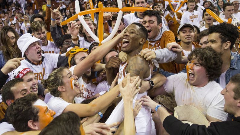 Texas guard Kerwin Roach II celebrates with students after the Longhorns defeated Oklahoma in college basketball on Saturday, February 3. Roach scored 19 points in the 79-74 victory.