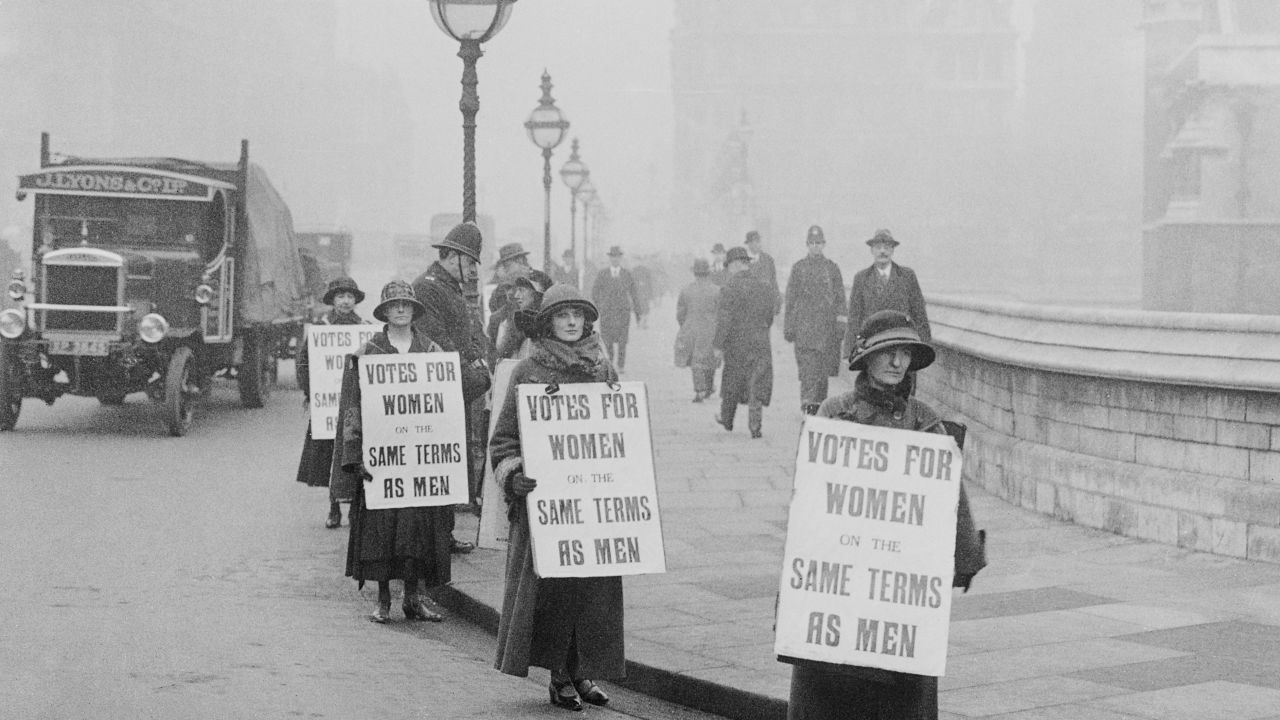 An undated photo shows a group of suffragists demonstrating outside the House of Commons in London.