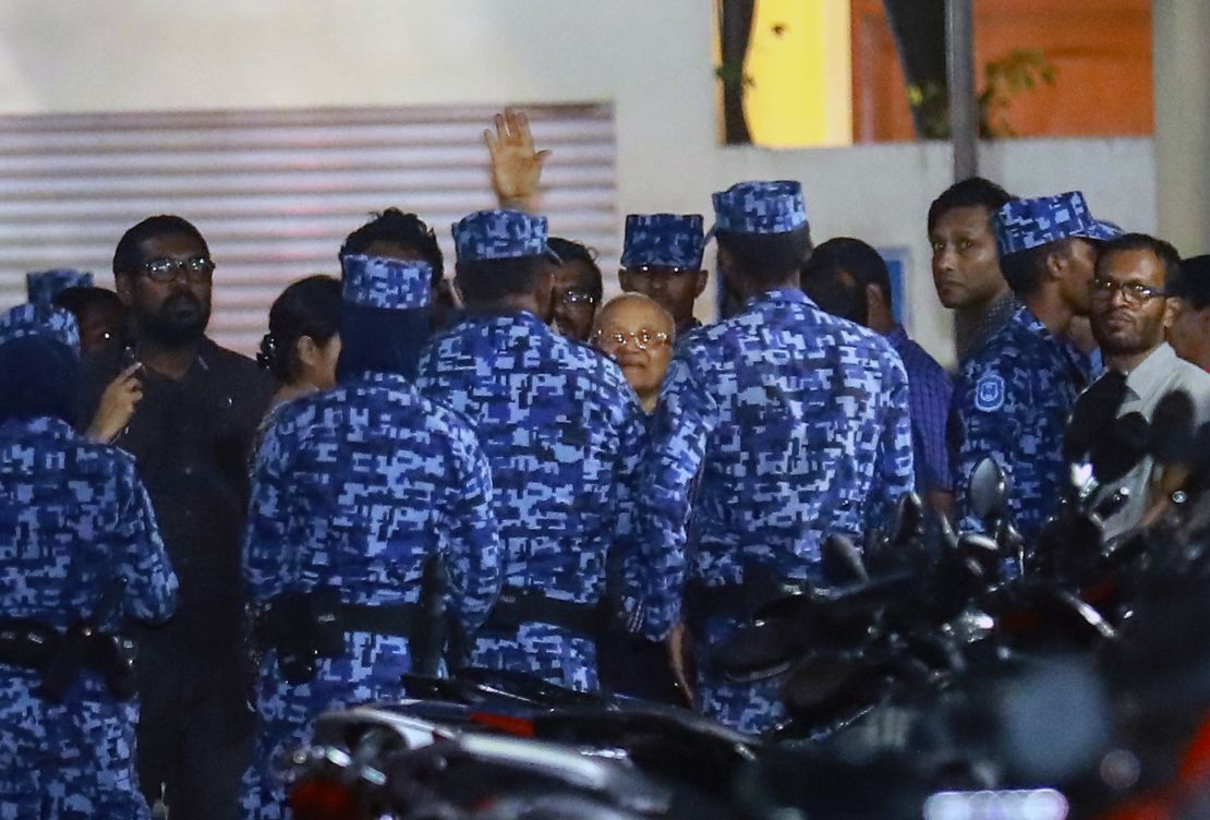 Policemen arrest former Maldives president and opposition leader Maumoon Abdul Gayoom on February 6.