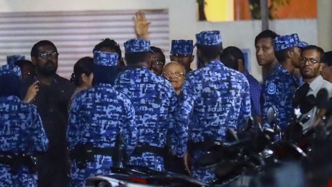 Policemen arrest former Maldives president and opposition leader Maumoon Abdul Gayoom on February 6.