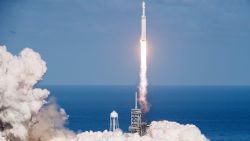 The SpaceX Falcon Heavy takes off from Pad 39A at the Kennedy Space Center in Florida, on February 6, 2018, on its demonstration mission.
The world's most powerful rocket, SpaceX's Falcon Heavy, blasted off Tuesday on its highly anticipated maiden test flight, carrying CEO Elon Musk's cherry red Tesla roadster to an orbit near Mars. Screams and cheers erupted at Cape Canaveral, Florida as the massive rocket fired its 27 engines and rumbled into the blue sky over the same NASA launchpad that served as a base for the US missions to Moon four decades ago.
 / AFP PHOTO / JIM WATSON        (Photo credit should read JIM WATSON/AFP/Getty Images)