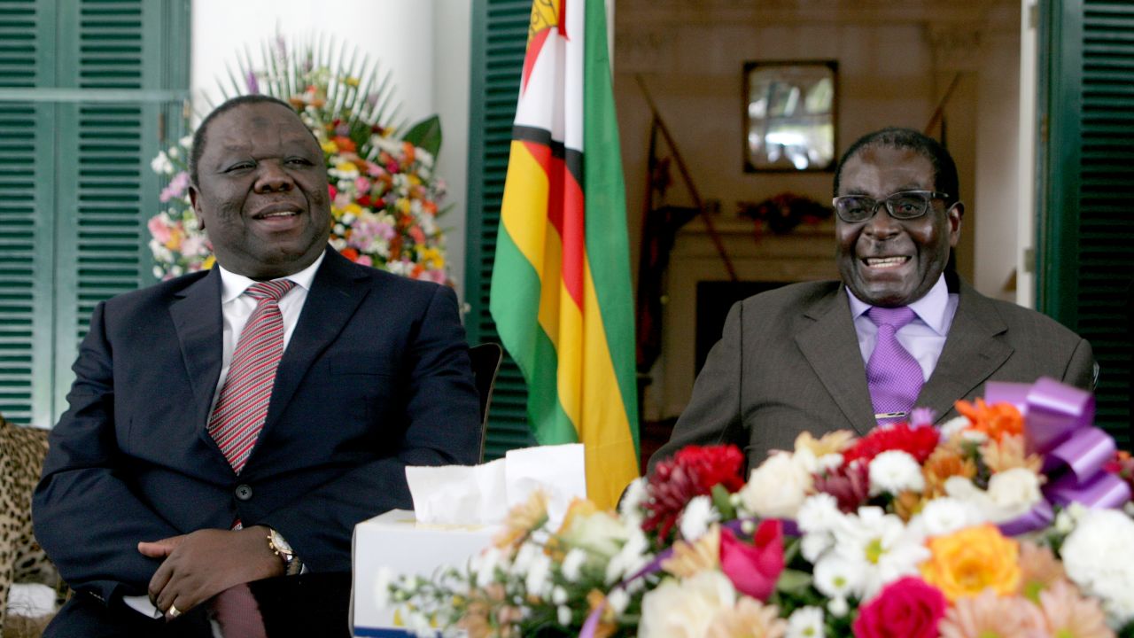 Tsvangirai (L) and Mugabe (R) pictured in 2013.