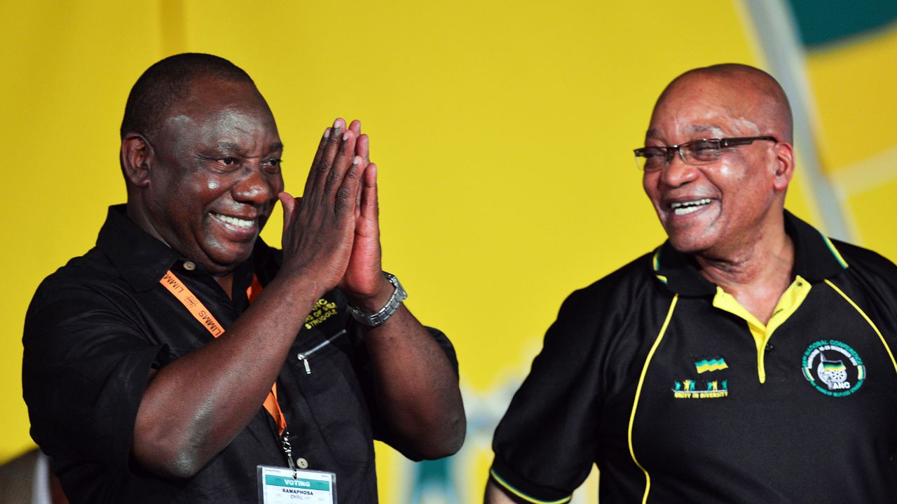 Zuma looks at Cyril Ramaphosa after Ramaphosa was elected deputy president of the ANC in December 2012. Zuma was re-elected as the party's president.