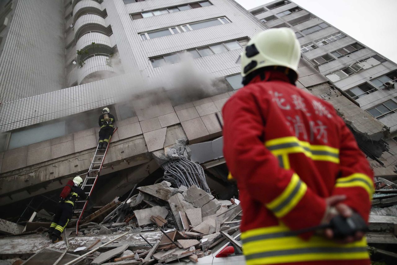 Rescuers search for survivors on February 7.