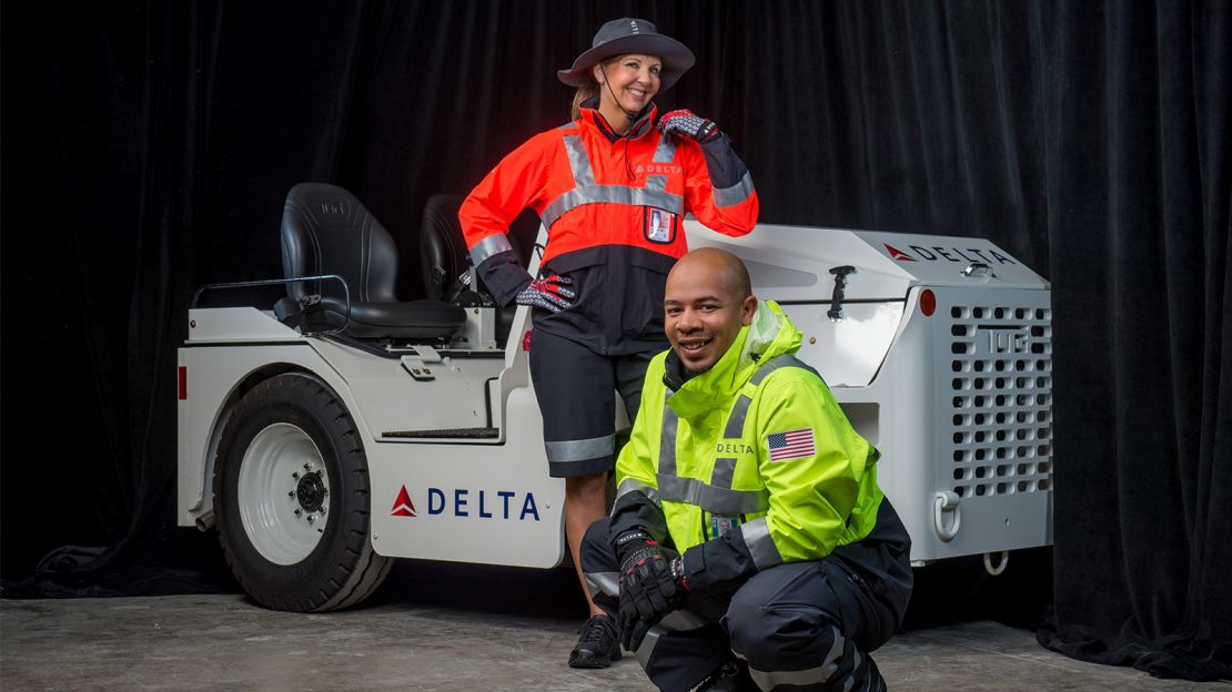 Real Delta employees model their new Posen-designed outfits.