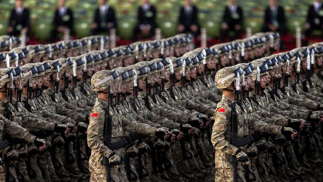 BEIJING, CHINA - SEPTEMBER 03:  Chinese soldiers march past Tiananmen Square before a military parade on September 3, 2015 in Beijing, China. China is marking the 70th anniversary of the end of World War II and its role in defeating Japan with a new national holiday and a military parade in Beijing. (Photo by Kevin Frayer/Getty Images)