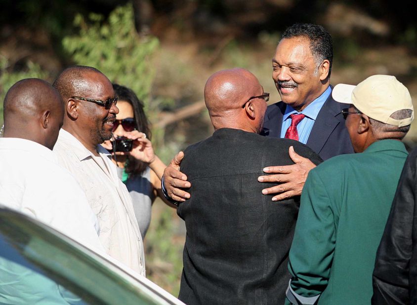 Zuma greets American civil-rights activist Jesse Jackson at a ceremony in Bloemfontein, South Africa, in January 2012.