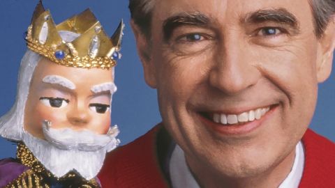 Mister Rogers poses with King Friday, a cantankerous puppet he voiced on "Mister Rogers' Neighborhood."