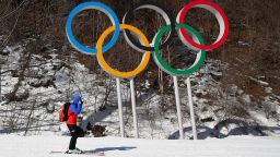 PYEONGCHANG-GUN, SOUTH KOREA - FEBRUARY 04:  A skier goes past the Olympic rings at the Jeongseon Alpine Centre prior to the PyeongChang 2018 Winter Olympic Games on February 4, 2018 in Pyeongchang-gun, South Korea.  (Photo by Ezra Shaw/Getty Images)