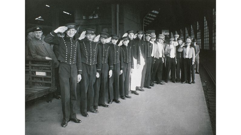 <strong>3. The Northern Route:</strong> Bellboys from Berlin's Hotel Adlon greet arriving guests on a train platform. With literary cafes and bohemian culture, the city became a magnet for artists, actors and writers. 