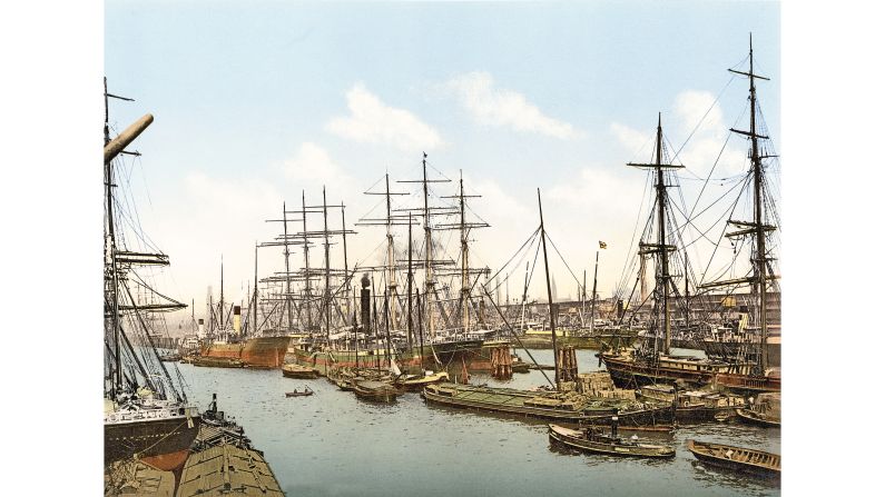 <strong>3. The Northern Route:</strong> Steamships and sailing vessels moored side-by-side at Hamburg's Asia Quay. Though sailing ships were used for commercial transport through the early 20th century, new steam technology cut travel times drastically. 