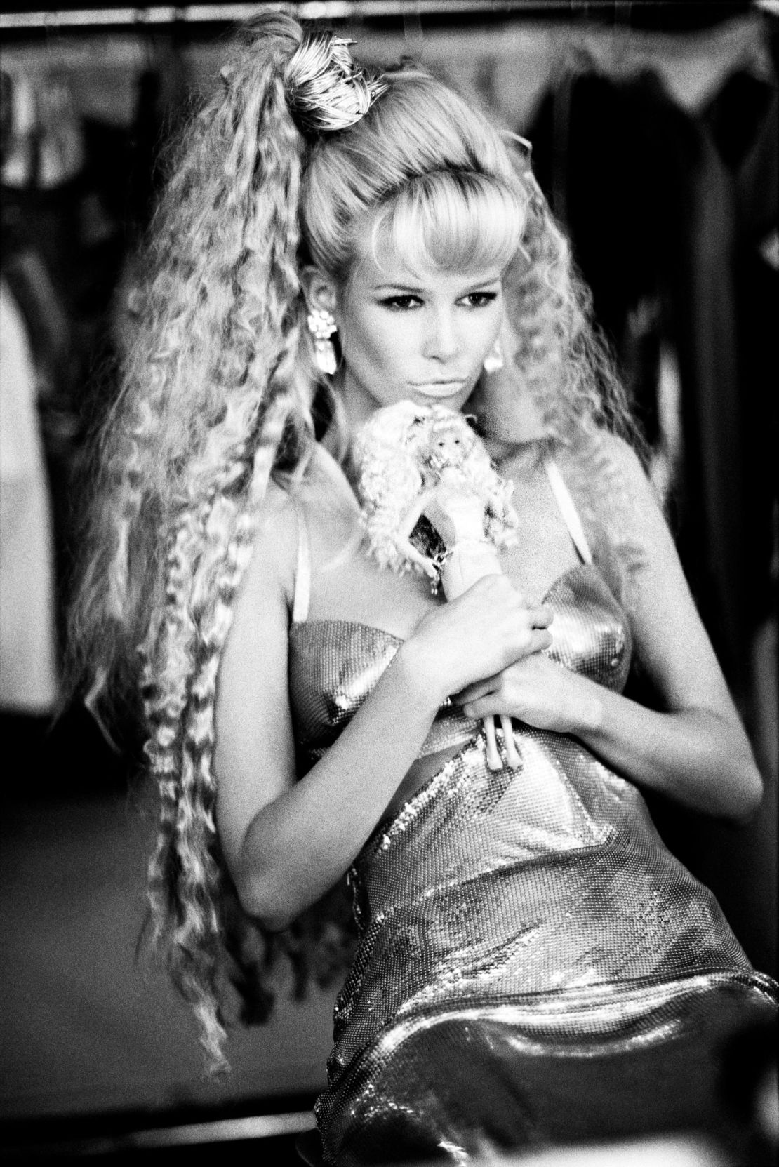 Schiffer poses as Barbie for Vogue Italia in 1994 in a Versace dress by Ellen von Unwerth 