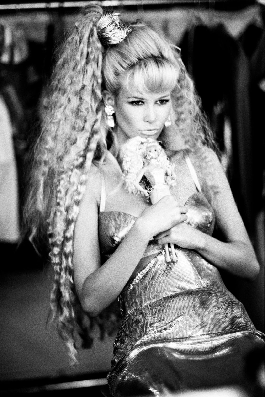 Schiffer poses as Barbie for Vogue Italia in 1994 in a Versace dress by Ellen von Unwerth