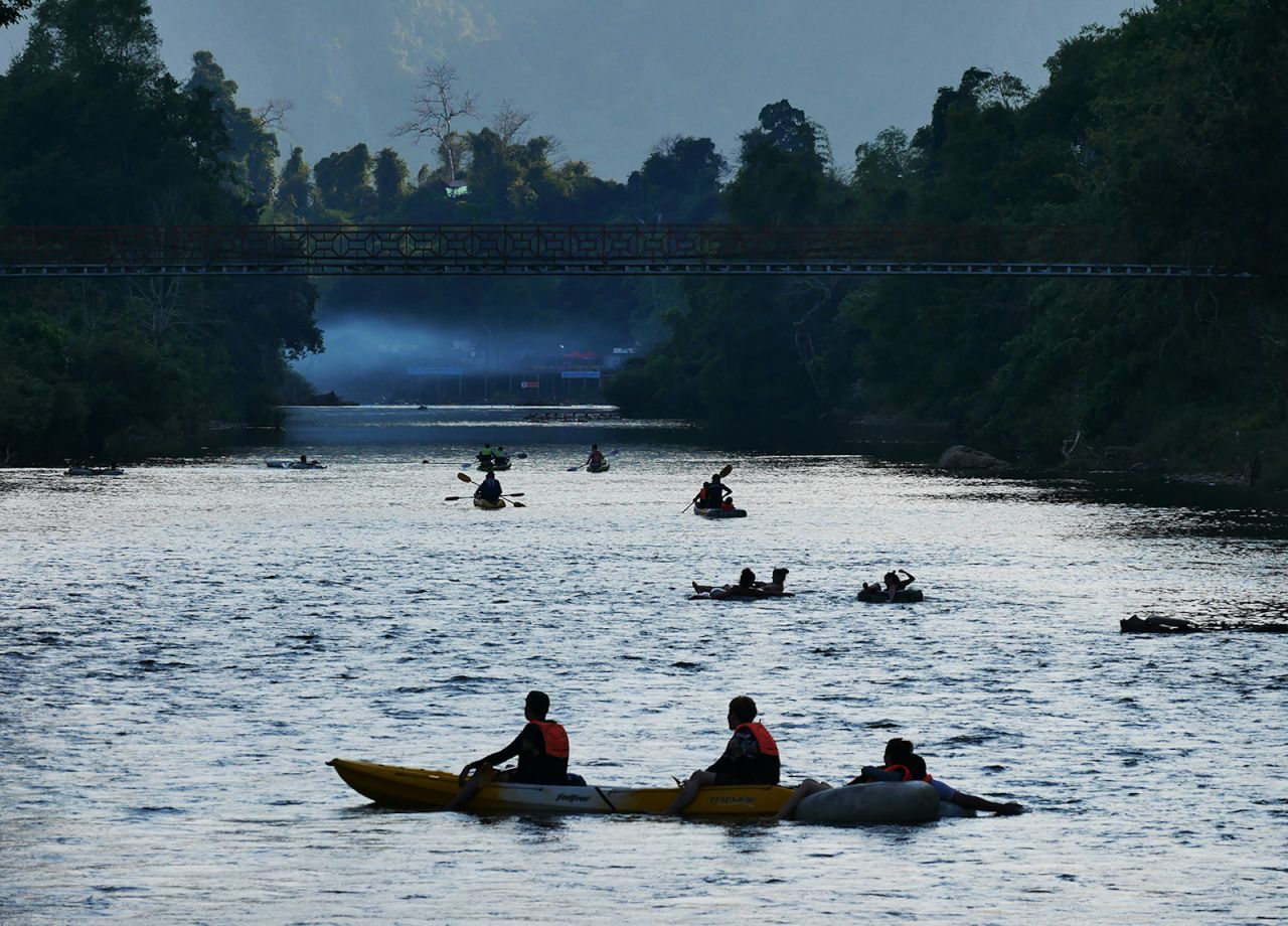 <strong>Old-fashioned river fun: </strong>While Vang Vieng has closed its dangerous water slides, one thing hasn't changed: A slow, easy river tubing ride remains the outdoor experience of choice. Travelers can rend kayaks and rafts. 