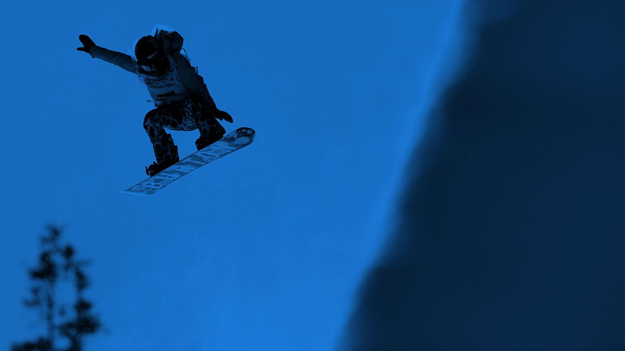 chloe kim usa snowboarder blue page top cuts