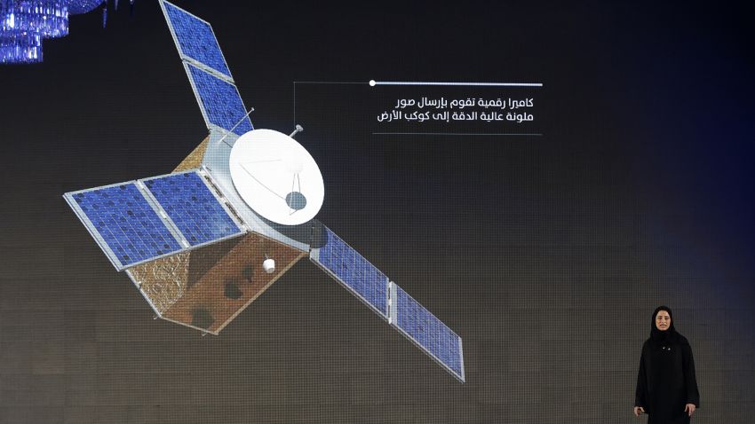 Sarah Al Amiri, deputy project manager of the United Arab Emirates (UAE) Mars Mission, stands on stage during a ceremony to unveil the mission in 2015.