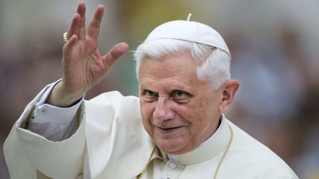 Vatican City, VATICAN CITY STATE: Pope Benedict XVI waves to the pilgrims before his weekly general audience on St-Peter's square at the Vatican, 15 June 2005. Pope Benedict XVI has asked Cardinal Josef Glemp to celebrate in Warsaw on Sunday the beatification of two Polish priests, the Vatican announced. AFP PHOTO/ Patrick HERTZOG (Photo credit should read PATRICK HERTZOG/AFP/Getty Images)