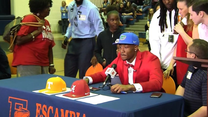 PENSACOLA, Fla. - Pensacola's Jacob Copeland will likely never forget his National Signing Day experience.    The Escambia High wide receiver decided to commit to Florida, and his mom wasn't a fan of the decision.    Copeland donned the Florida Gators' hat on ESPN, and his mom, wearing an Alabama sweater and a Tennessee hat, walked off the set.