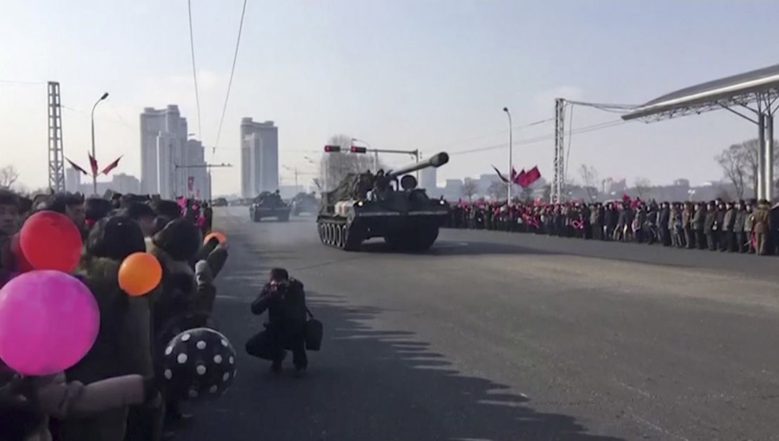 This image taken from video footage provided by Paektu Cultural Exchange shows military vehicles through streets in Pyongyang, February 8.