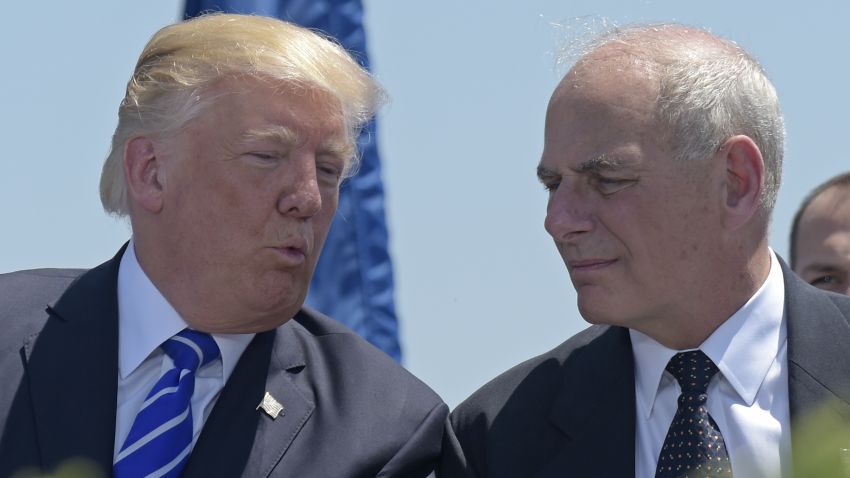 In this May 17, 2017, file photo, President Donald Trump talks with Homeland Security Secretary John Kelly during commencement exercises at the U.S. Coast Guard Academy in New London, Conn. Trump named Kelly as his new Chief of Staff on July 28, ousting Reince Priebus.