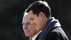 White House staff secretary Rob Porter, front, walks with White House Chief of Staff John Kelly, to board the Marine One on the South Lawn as they leave the White House in Washington, Friday, Feb. 2, 2018, with President Donald Trump en route to the Customs and Border Protection National Targeting Center in Sterling, Va. 