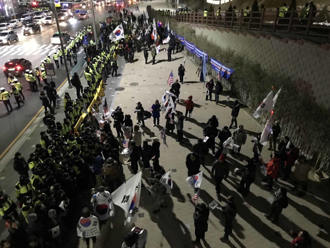 A small anti-North Korea protest behind police lines near Gangneung Art Center where North Korean art troupe is performing.