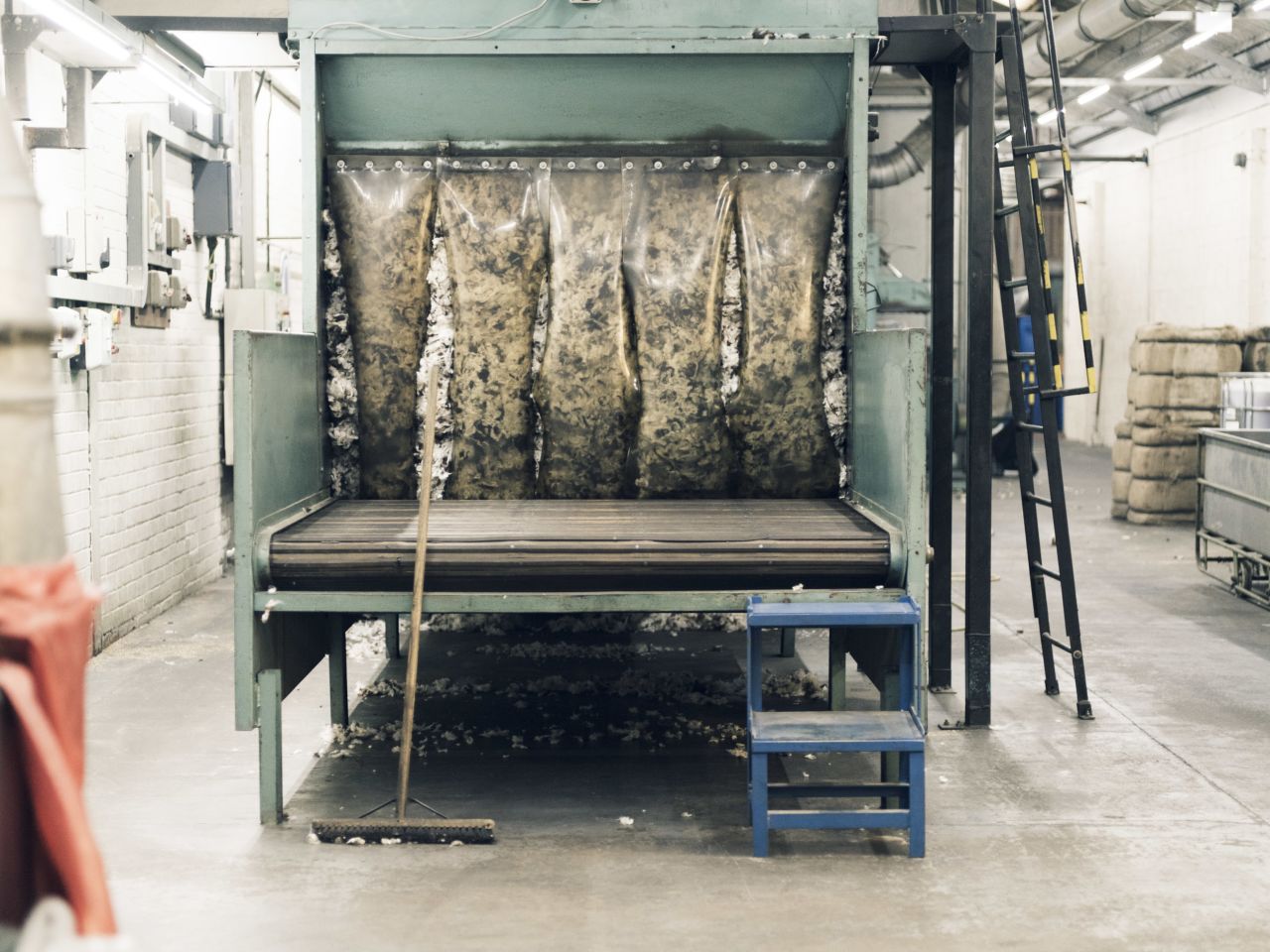 It's then sent to factories to perform a scouring and de-hairing process and further remove any coarse residue hair. The fiber is then spun and twisted into fine yarn, ready to be made into clothing such as coats, sweaters, scarves or socks.<br />