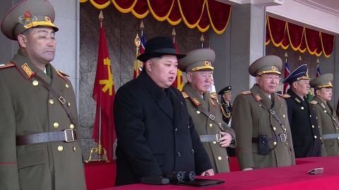 North Korean leader Kim Jong Un watches the February 8 military parade from a balcony.