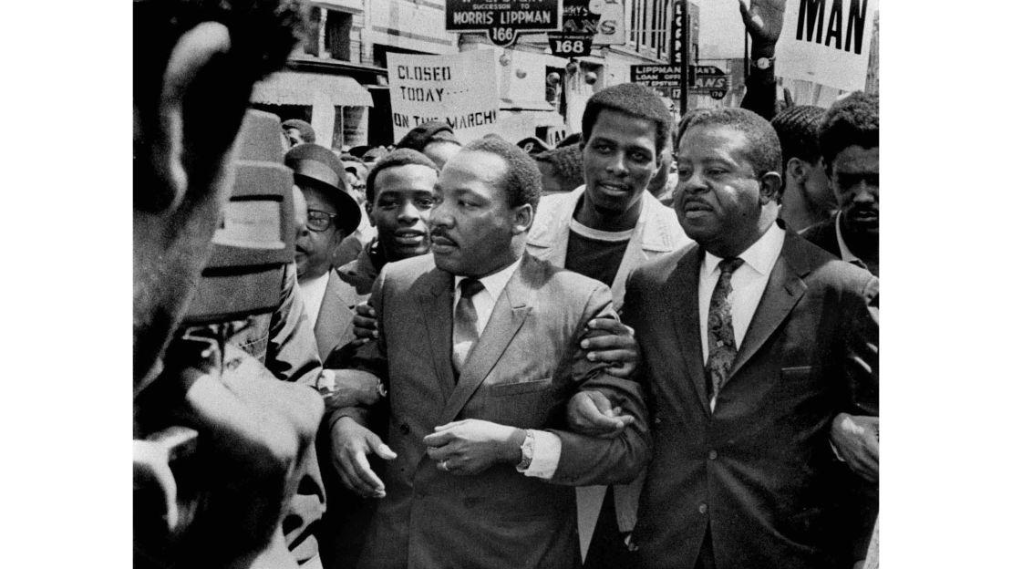 The Revs. Martin Luther King Jr. and Ralph Abernathy, right, lead a march on behalf of striking sanitation workers in Memphis in March 1968.