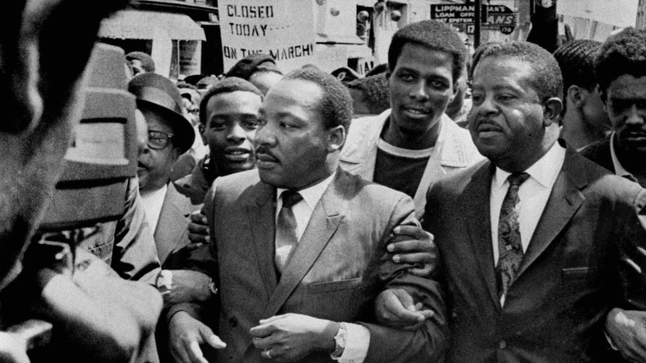 The Revs. Martin Luther King Jr. and Ralph Abernathy, right, lead a march on behalf of striking sanitation workers in Memphis in March 1968.