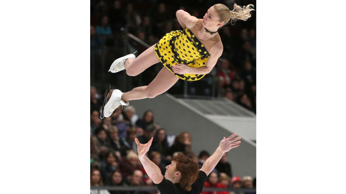 Tarasova and Morozov perform their signature quad twist.