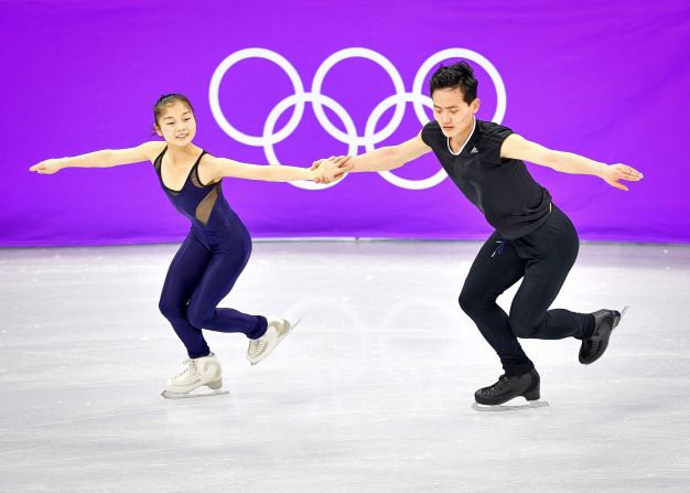 Ryom Tae Ok (L) and Kim Ju Sik of North Korea practice at the Gangneung Ice Arena on February 8, 2018, ahead of the pairs figure skating competition of the Pyeongchang 2018 Winter Olympic Games.