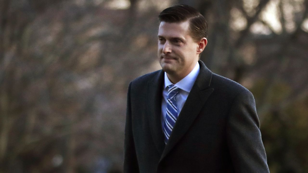 White House staff secretary Rob Porter, left, walks with White House senior adviser Stephen Miller from Marine One across the South Lawn of the White House in Washington, Monday, Feb. 5, 2018, as they return with President Donald Trump form Ohio. (AP/Manuel Balce Ceneta)