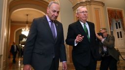 WASHINGTON, DC - FEBRUARY 07:  Senate Minority Leader Charles Schumer (D-NY) (L) and Senate Majority Leader Mitch McConnell (R-KY) walk side-by-side to the Senate Chamber at the US Capitol February 7, 2018 in Washington, DC.(Chip Somodevilla/Getty Images)