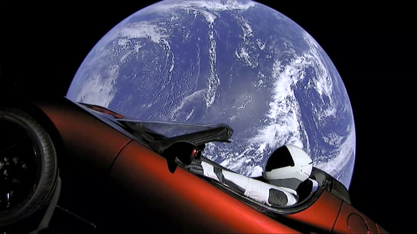 A dummy in a space suit is seen behind the wheel of Elon Musk's red Tesla sports car as it floats in space on Tuesday, February 6. Musk's pioneering rocket firm, SpaceX, carried out what appears to be a seamless <a href="http://money.cnn.com/2018/02/06/technology/future/spacex-falcon-heavy-launch-mainbar/index.html" target="_blank">first launch of its massive new rocket</a>, called Falcon Heavy, which took flight Tuesday from Kennedy Space Center in Florida. Falcon Heavy is the world's most powerful rocket.