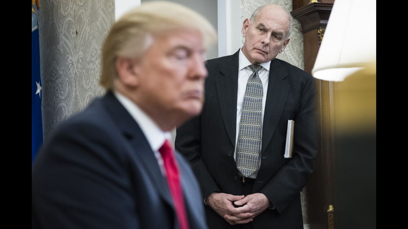 White House chief of staff John Kelly listens to US President Donald Trump during a meeting with North Korean defectors at the White House on Friday, February 2. Trump talked to reporters about the release of a disputed GOP intelligence memo that alleges FBI abuses of its surveillance authority. House Republicans, with the approval of Trump, <a href="https://www.cnn.com/2018/02/02/politics/republican-intelligence-memo/index.html" target="_blank">declassified the memo</a> on Friday.