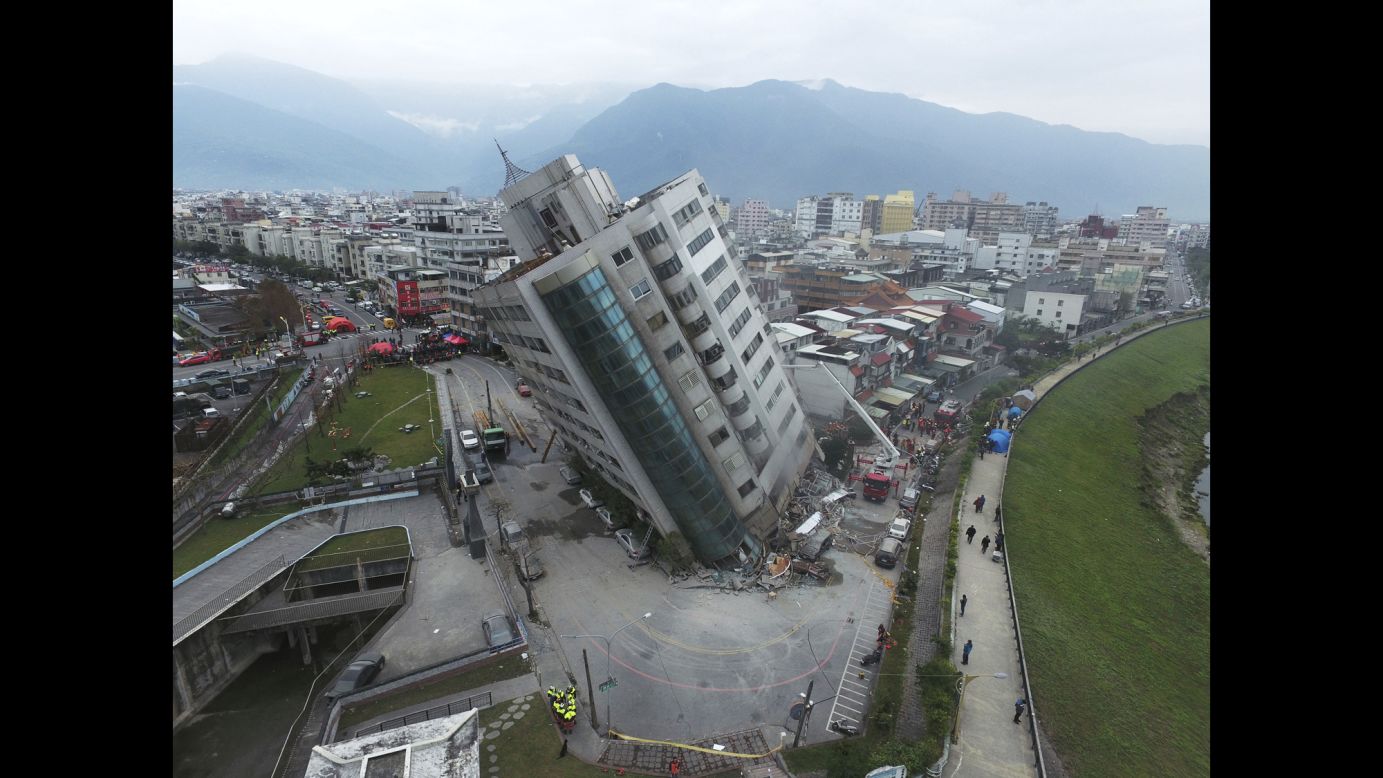 A residential building leans after <a href="http://www.cnn.com/2018/02/07/asia/taiwan-earthquake-hualien-intl/index.html" target="_blank">an earthquake in Hualien, southern Taiwan</a>, on Wednesday, February 7. At least nine people were killed and 270 injured when the magnitude-6.4 quake struck late Tuesday, February 6, 22 kilometers (13 miles) north of the city of Hualien, authorities said. It also damaged bridges and buckled roads in and around Hualien.