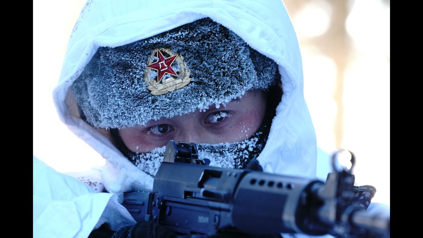 A soldier takes part in a training exercise in Beiji Village on the border county of Mohe, northeast China, on Friday, February 5.