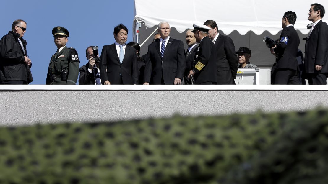 U.S. Vice President Mike Pence inspects a PAC-3 interceptor missile system with Japanese Defense Minister Itsunori Onodera in Tokyo.