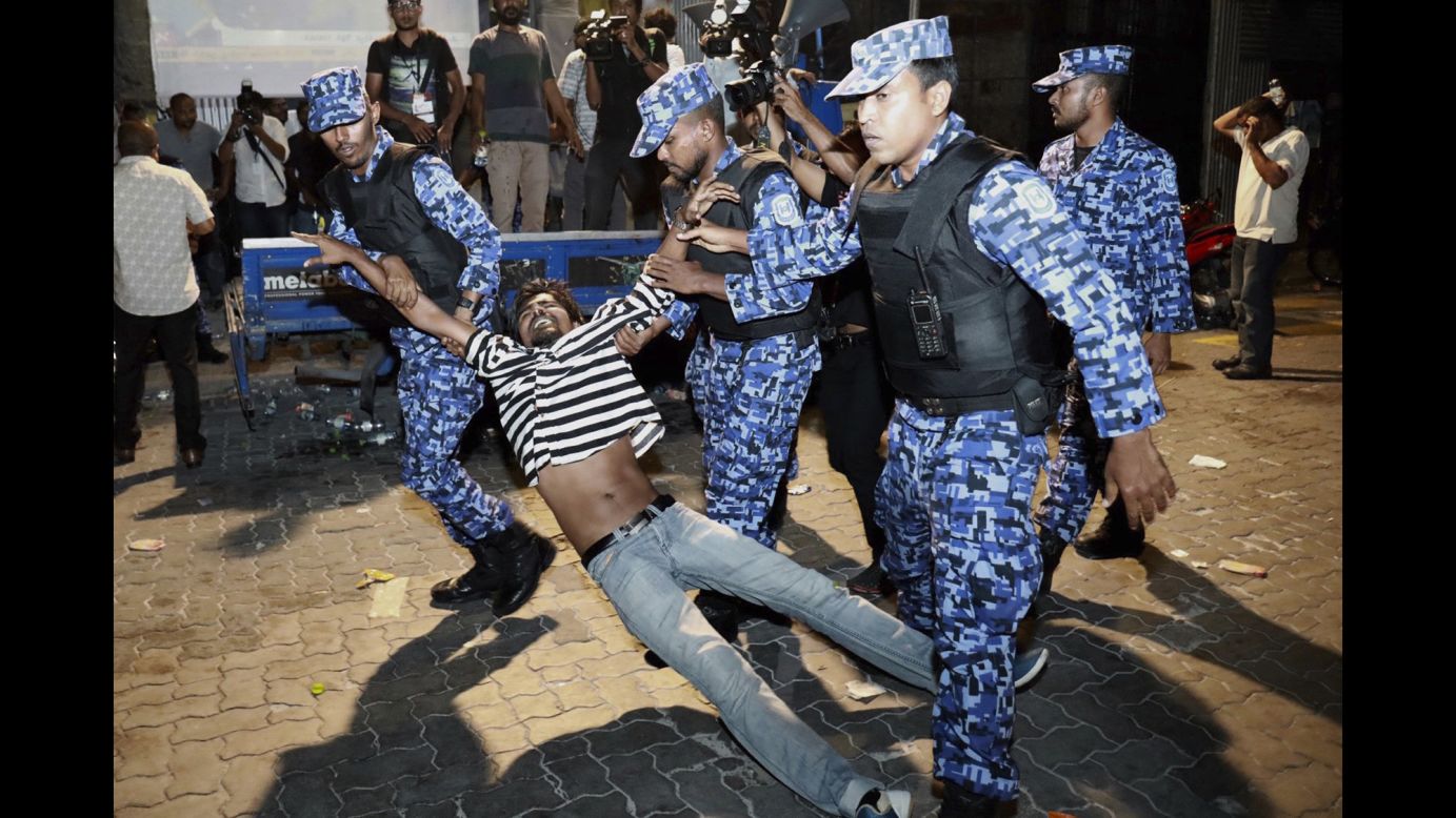 Police detain a protester demanding the release of political prisoners during a demonstration in Malé, Maldives, on Friday, February 2. <a href="http://www.cnn.com/2018/02/06/asia/maldives-political-unrest-explainer-intl/index.html" target="_blank">What's happening in the Maldives? All you need to know</a>