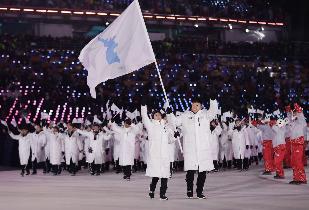 North and South Korean athletes march together during the parade of nations. It has happened only three other times in Olympic history.