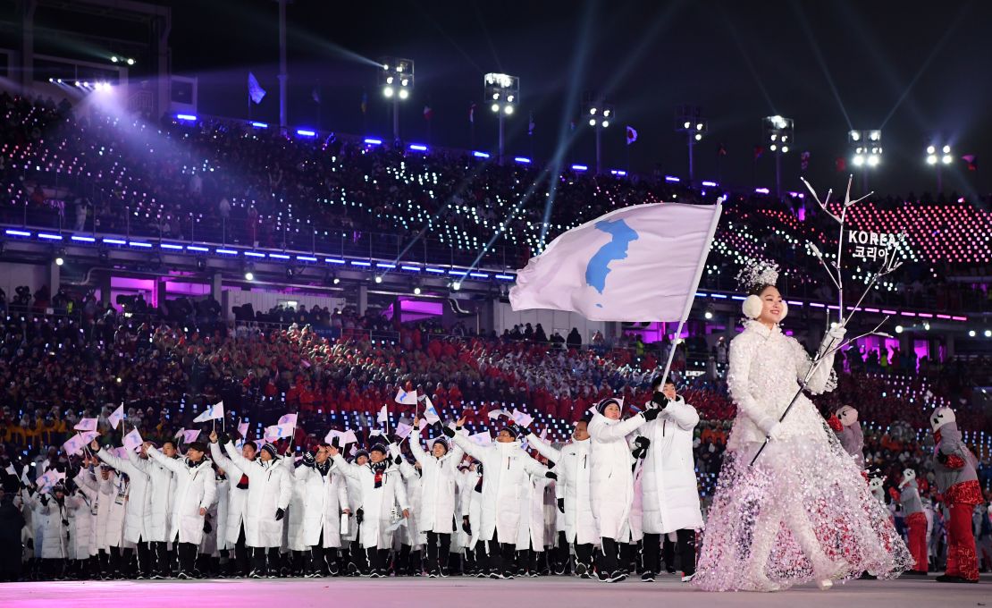 North and South Korea marched together at the Olympics opening ceremony under a unified flag.