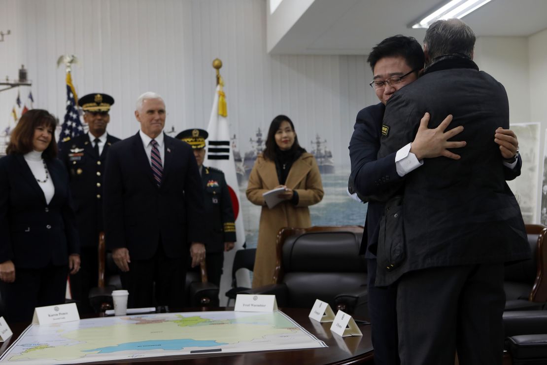  Fred Warmbier(R), the father of Otto warmbier who was imprisoned in North Korea for 17 months gives hug to Ji Seong-ho (second left), North Korean defector while U.S. Vice President Mike Pence looks on.
