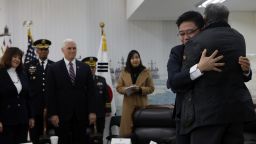 PYEONGTAEK, SOUTH KOREA - FEBRUARY 09: Fred Warmbier(R), the father of Otto warmbier who was imprisoned in North Korea for 17 months gives hug to Ji Seong-ho (second left), North Korean defector while U.S. Vice President Mike Pence looks on at the meeting room in the South Korean Navy 2nd Fleet Commnad on February 9, 2018 in Pyeongtaek, South Korea. The U.S. Vice President Mike Pence is visiting South Korea and will lead the U.S. delegation in the opening ceremony of PyeongChang Winter Olympic Games.  (Photo by Woohae Cho/Getty Images)