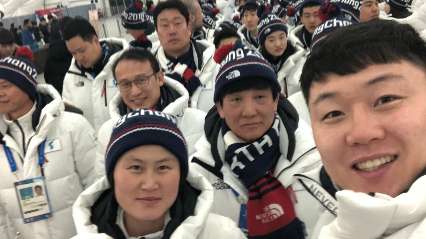Athletes from North and South Korea pose for a selfie
