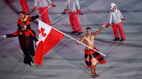 Tonga's Pita Taufatofua repeated his topless flag-bearing from Rio 2016.