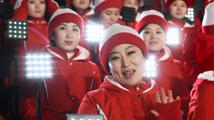 Members of the North Korean cheering band wave ahead of the opening ceremony of the Pyeongchang 2018 Winter Olympic Games at the Pyeongchang Stadium on February 9, 2018. / AFP PHOTO / POOL / FRANCK FIFE        (Photo credit should read FRANCK FIFE/AFP/Getty Images)