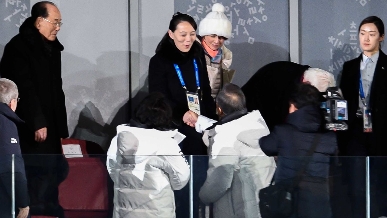 The sister of North Korean leader Kim Jong Un, Kim Yo Jong, center, shakes hands Friday with South Korean President Moon Jae-in during the Opening Ceremony of the Pyeongchang 2018 Winter Olympic Games.